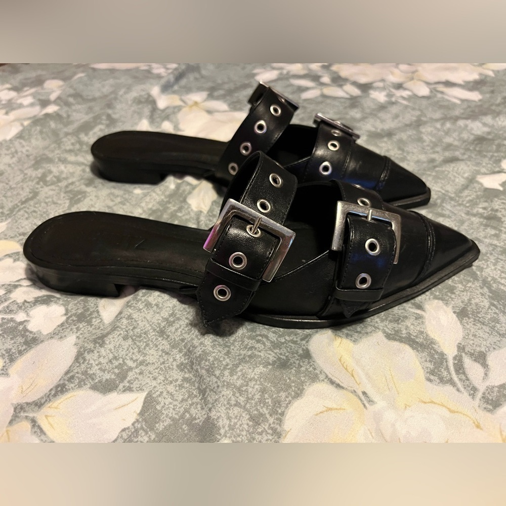 Schutz black buckle flats